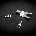 The C-MARC™ grounding wire can be made with small ring or spade type connectors, or with a large Xhadow spade. The Xhadow spade is the same type we use on our loudspeaker cables. The Blackbody only accepts the smaller two connectors, and the ring type is most recommended.