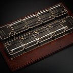 The ten <b>BlackGround</b> modules inside the <b>BlackGround 10x Power Base</b> are potted directly against the wooden baseboard.