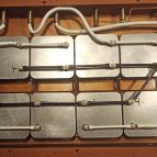 Here you see the inner wiring of the 8x dual channel version. The white flexible cabling is C-MARC™ large cross section unique Litz wire, a unique technology developed and manufactured by LessLoss for the very best audio applications. It is adhered to the wooden chassis for even greater vibration control.