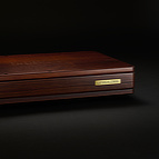 The <b>BlackGround 8x Speaker Base</b> features a hand sanded, lacquered wooden enclosure.