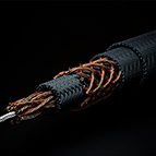Pictured above is the C-MARC™ Coaxial cable, Bulk. It is highly flexible and features 192 individually enameled, 0.125mm diameter copper conductors around a 100% cotton core. The copper structure is then overbraided with 100% natural, mercerized cotton fiber, then another braid of 192 enameled copper wires. On top are two layers of mercerized cotton fiber braids. No plastics throughout. The total conductive cross section of this wire is 2 x 2.304mm^2. We use this wire for our C-MARC™ RCA interconnects and loudspeaker cable.This wire is perfect for internal power and loudspeaker signal wiring and represents a huge upgrade to existing wire technologies. In one application, where all strands are adjoined at the ends, professional end prepping carried out by LessLoss Audio is available.