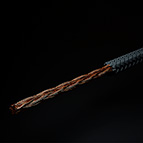 Pictured above is the C-MARC™ Hook-up Wire, Small. It is highly flexible and features 72 individually enameled, 0.125mm diameter copper conductors overbraided with 100% natural cotton fiber. No plastics throughout. The total conductive cross section of this wire is 0.864mm^2. This wire is perfect for internal signal wiring and represents a huge upgrade to existing wire technologies. Professional end prepping carried out by LessLoss Audio is available as an option for this product, as it is a true Litz wire and must be tinned prior to soldering.