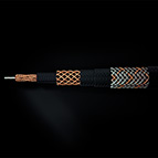 Pictured above is the inner structure of the C-MARC™ Triaxial cable. It is highly flexible and features 192 individually enameled, 0.125mm diameter copper conductors around a 100% cotton core. This copper structure is then over-braided with 100% natural, mercerized cotton fiber, then another braid of 192 enameled copper wires. Then come two layers of mercerized cotton fiber braids. Then the third braid of copper and cotton together, followed by two outer braids of cotton. There are no plastics throughout.