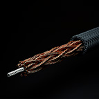 Pictured above is the inner structure of one of the three hand-braided polarities that make up one channel of the C-MARC™ XLR cable. It is highly flexible and features 192 individually enameled, 0.125mm diameter copper conductors. This copper structure is then over-braided with 100% natural, mercerized cotton fiber. There is no plastic insulation.