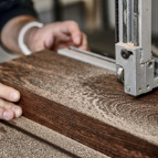 We begin by sawing the Wenge hardwood boards into manageable sized pieces.