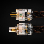 Pictured side by side, both ends of C-MARC™ <b>Stellar</b> Entropic Process power cable. <b>Stellar</b> always features <i>Entropic Process</i> by default. This one features the US/Japan/China wall plug.