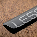 The LessLoss logo decorates the lower right corner of the lid.