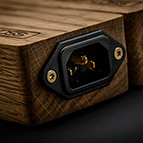 For superb vibration control, the cryogenically treated solid gold plated copper C14 inlet is mated directly against the milled solid oakwood enclosure. No metal can provide this type of performance.