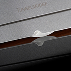 Close-up of center foot. The LessLoss Tunnelbridge PSU features three perfectly symmetrical feet, for ultimate stability while placed on a hard surface.
